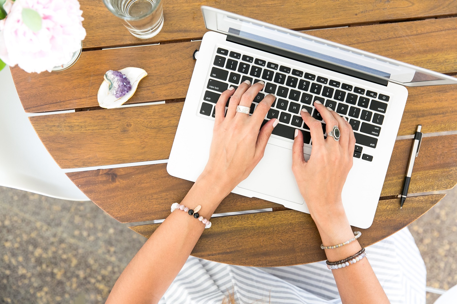 blogging typing on laptop