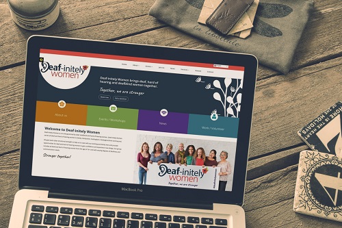 Deafinitely Women website mock up in laptop